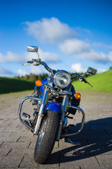 front view of retro motorbike on the road