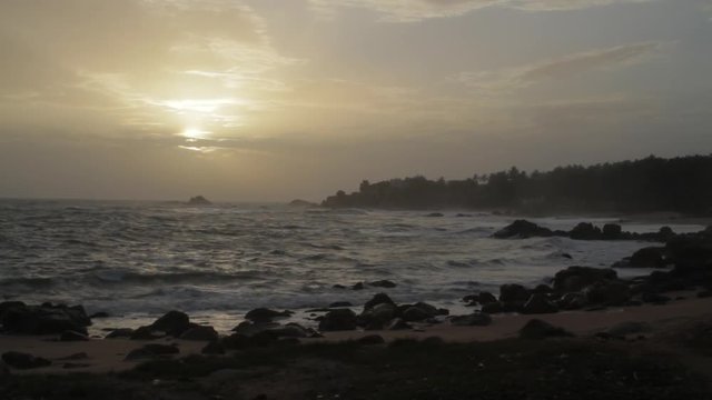 Waves break on the rocky beaches of Muttom in India.