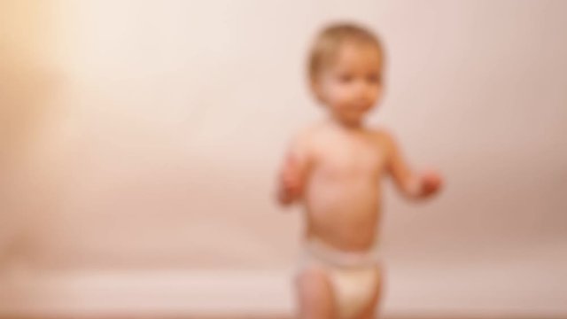 close up of baby feet doing the first steps