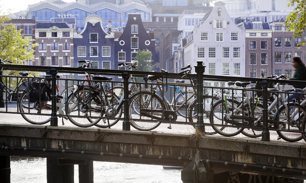 Bicycles attached to a bridge in Amsterdam