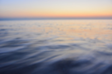 Obraz premium Blur water background with ripples Sea Ocean water surface textu