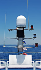 Navigation radar and lights on the bow of a ferry boat