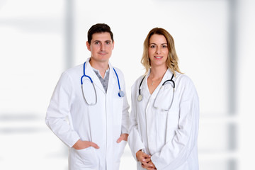 young friendly medical team with book in lab coat