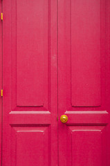 Fototapeta premium Door knob golden color with pink, door background