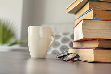 Reading book with eyeglasses