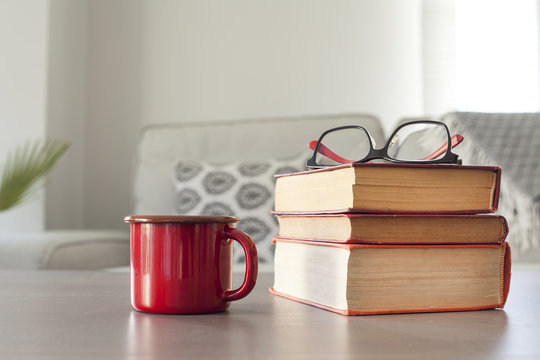 Reading book with eyeglasses