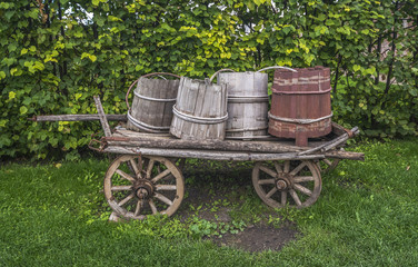 Old wagon with barrels.