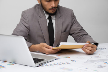 Businessman reading report