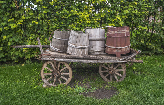 Old wagon with barrels.