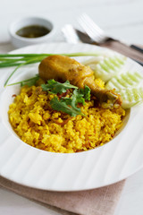 Close up of chicken biryani yellow curry rice
