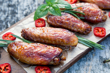 Baked spicy chicken wings in the Asian style