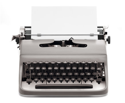 vintage typewriter with blank paper to type on