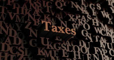 Taxes - Wooden 3D rendered letters/message.  Can be used for an online banner ad or a print postcard.