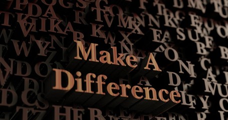 Make A Difference - Wooden 3D rendered letters/message.  Can be used for an online banner ad or a print postcard.