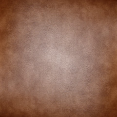 Brown leather texture closeup background.