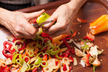 woman cutting pepper 