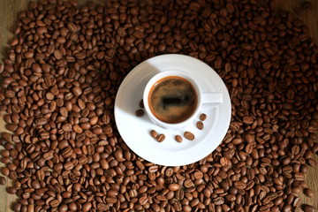 Naklejka premium coffee espresso on coffee beans background