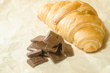 Tiles chocolate with a croissant