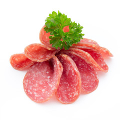 Salami smoked sausages slices isolated on white background.
