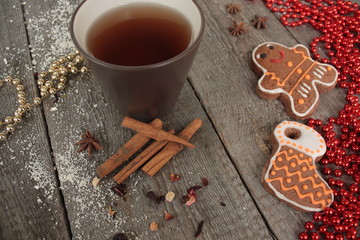 Christmas gingerbread cinnamon, Christmas decorations, tea, beads, Santa's sleigh. beautiful festive dessert.