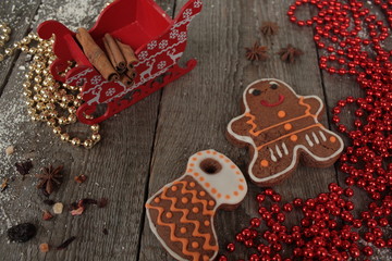 Christmas gingerbread cinnamon, Christmas decorations, tea, beads, Santa's sleigh. beautiful festive dessert.
