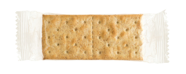 Pack of whole wheat crackers on white background - Pacchetto di cracker integrali su sfondo bianco