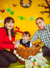 Baby in basket with family on a fairy glade