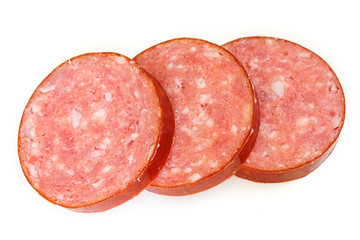 Three round pieces of smoked sausage