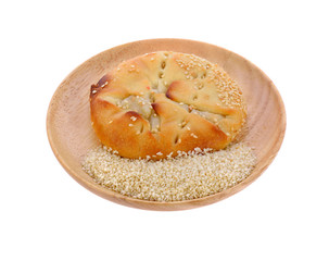 Traditional bread in wooden plate isolated on white background