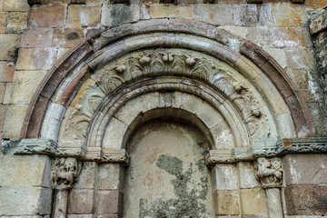 dazzled door of the Romanesque church of Santa Eulalia in the Brañosera town in Palencia, Castile and León, Spain