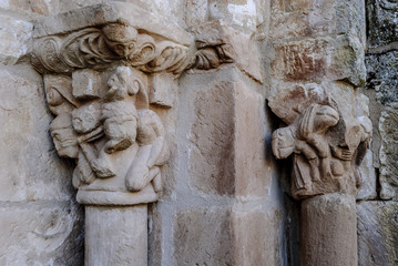 sight of the capitals of the Romanesque church of Santa Maria the Real one in the Cillamayor town in Palencia, Castile and León, Spain