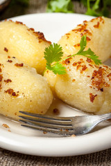 Potato dumplings stuffed with minced meat.