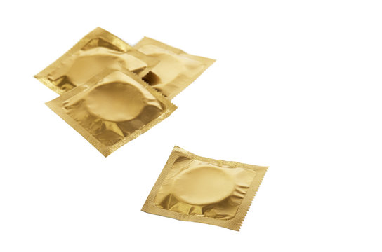 four condoms isolated on the white background