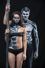 Fototapeta na wymiar Couple of dancers with body-art 