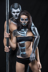 Fototapeta na wymiar Couple of dancers with body-art 