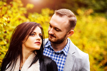 Fototapeta premium Pretty couple walking outdoor in the park