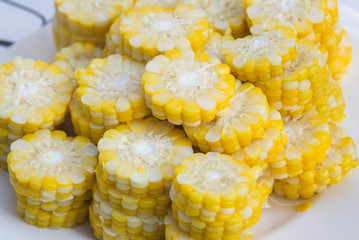 corn on the cob cutaway slice on white dish