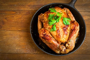 baked chicken,Style rustic.Selective focus.Top view, space for text.