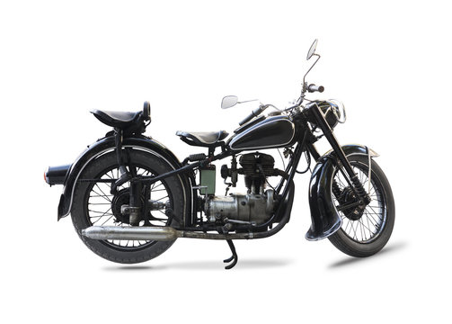Old black motorcycle isolated on white