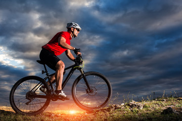 Fototapeta na wymiar Mountain Bike cyclist riding single track
