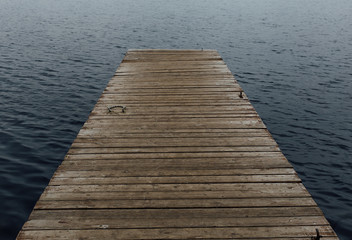 Obraz premium old wooden jetty on a lake