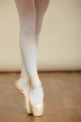 Ballerina's legs in pointe.