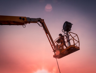 Lighting technician working on a shoot