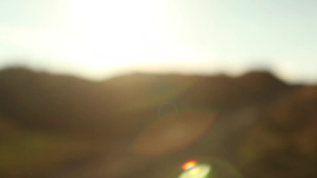 POV Point of view Beautiful sun flare, heavenly sun rays, golden magic hour