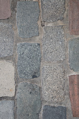 Grey and red brick stone street sidewalk,