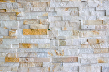 Obraz premium Pattern of grey and rough sandstone wall texture and backgroundม stone Cladding wall