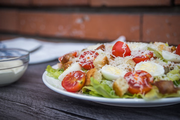 Healthy Grilled Chicken Caesar Salad with Cheese and Croutons