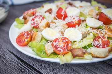 Healthy Grilled Chicken Caesar Salad with Cheese and Croutons