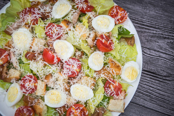 Healthy Grilled Chicken Caesar Salad with Cheese and Croutons