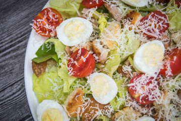 Healthy Grilled Chicken Caesar Salad with Cheese and Croutons